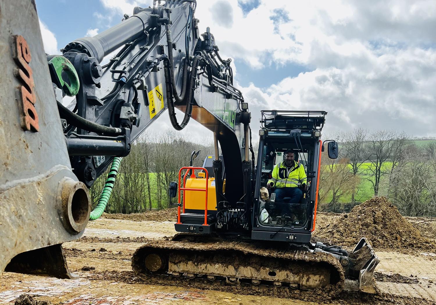 Volvo EC140 14-tonne excavator with operator working in Hampshire