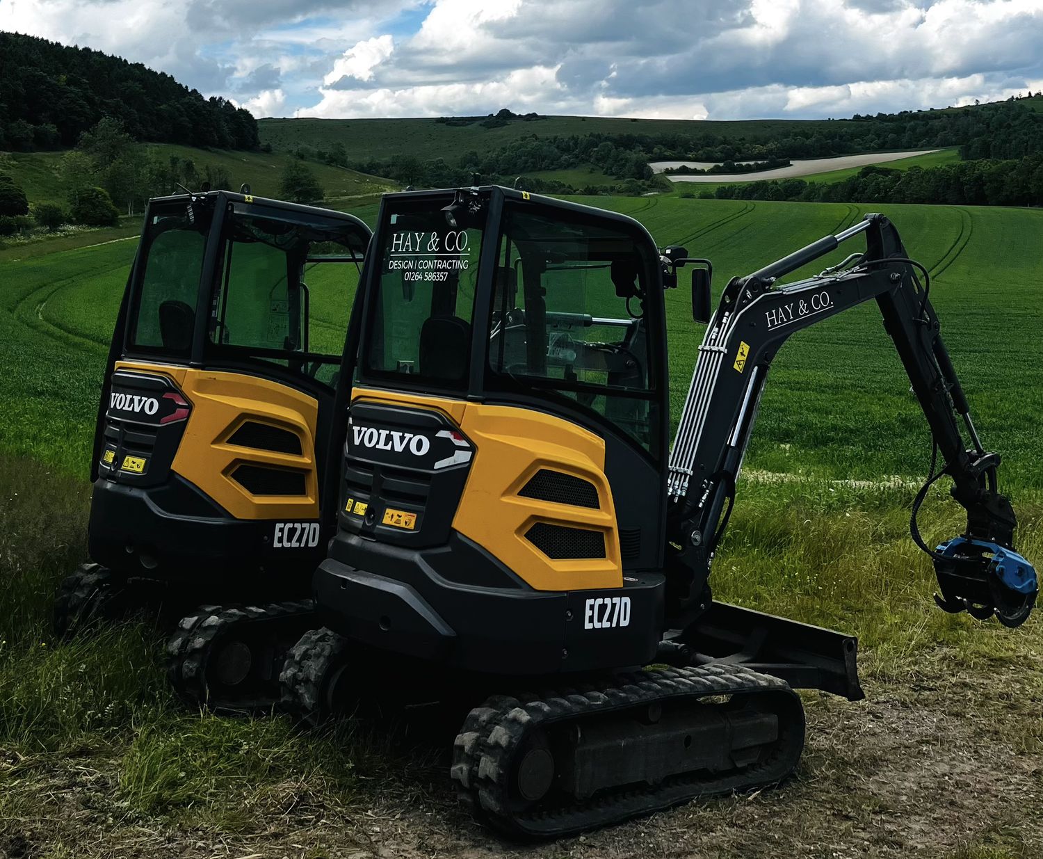 Two Volvo EC27D 3-tonne excavators with tilting grading buckets and hydraulic quick hitches