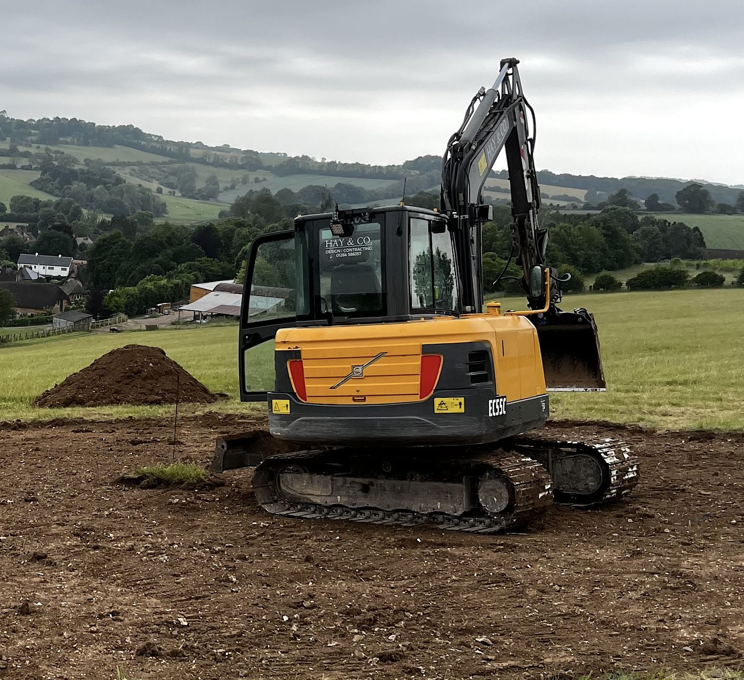 Volvo EC55C 6-tonne excavator on low-ground-pressure tracks with grading blade