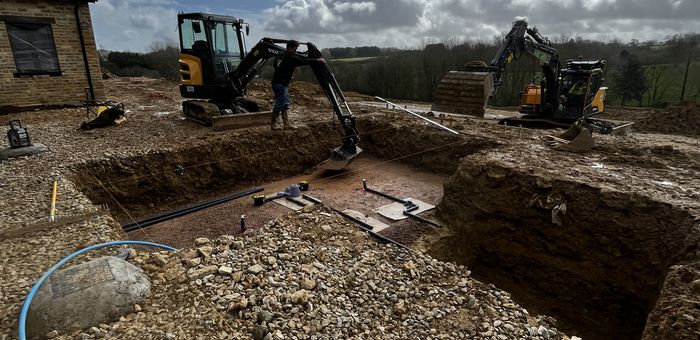 Groundworks excavation and drainage in progress