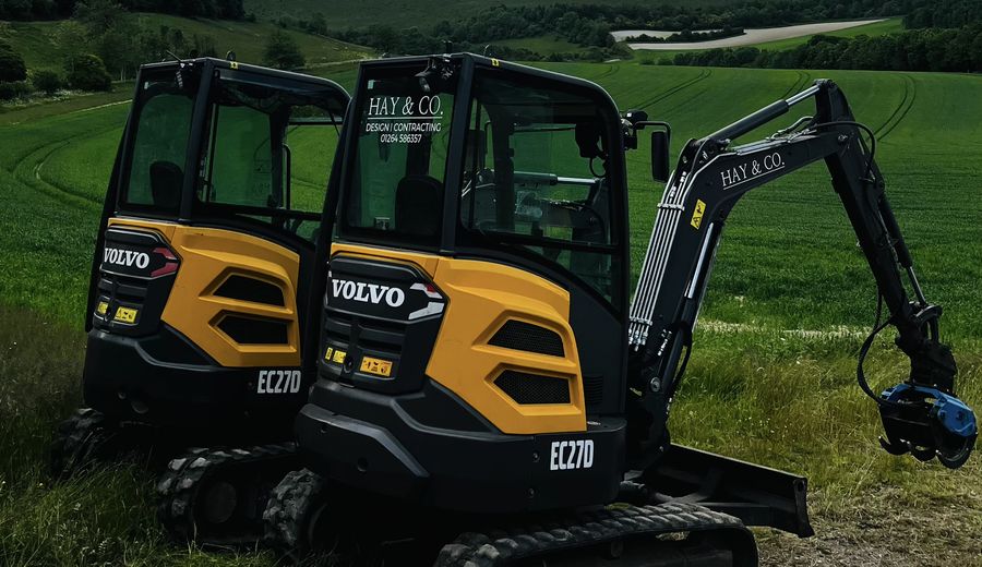 Two Volvo EC27D 3-tonne excavators with tilting grading buckets